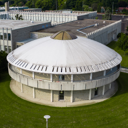 A close-up drone photo of the library dome.